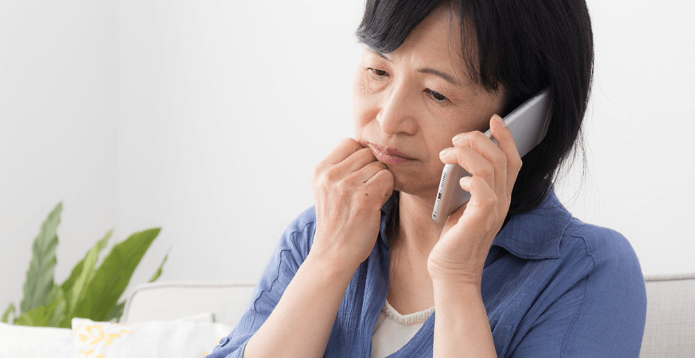 Photo of a woman on the phone