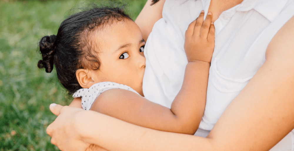 Photo of a child breastfeeding