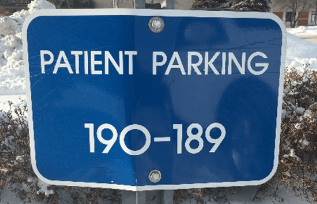 Photoi of a patient parking sign